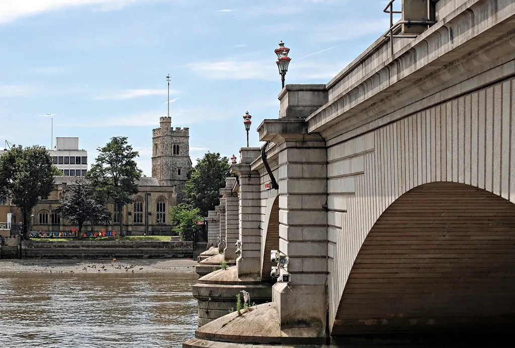 Putney Bridge and St Mary's Church, at the Putney end of the bridge where it meets Putney High Street and Lower Richmond Road.