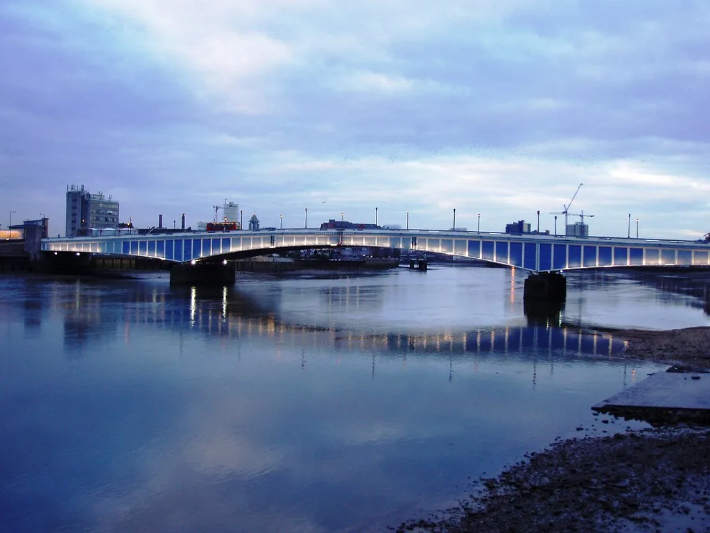 Wandsworth Bridge at dusk, seen from the river bank. The photograph was taken before this year's works.